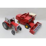A LARGE SCALE DIE-CAST SHOW ROOM MODEL OF A MASSEY FERGUSON 780 COMBINE HARVESTER, and a MASSEY