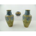 A PAIR OF ROYAL DOULTON STONEWARE VASES each in blue green colouring with piped flower belly