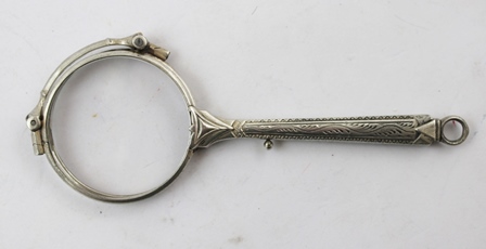 A PAIR OF VICTORIAN STYLE SILVER COLOURED METAL LORGNETTES with spring action and bright cut handle,