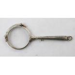 A PAIR OF VICTORIAN STYLE SILVER COLOURED METAL LORGNETTES with spring action and bright cut handle,