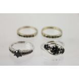 FOUR DRESS RINGS; two in base metal and two in 9ct white gold