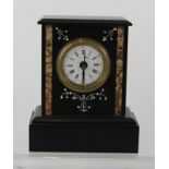 A LATE 19TH CENTURY FRENCH BLACK SLATE ALARUM TIMEPIECE having marble inlaid front and step