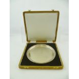 HISTORICAL HEIRLOOMS LTD. A SILVER WAITER/TRAY of plain circular form with bead applied wire edge,