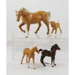 A SELECTION OF BESWICK EARTHENWARE MODEL HORSES comprising; a prancing palomino model no.836, 7.