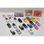 TWENTY FIVE VW BEETLE DIE-CAST MODEL VEHICLES many being cabriolet design and including a