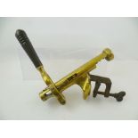 A.P. REYNOLDS & COMPANY, LONDON AN EARLY 20TH CENTURY COUNTER-TOP BRASS CANTILEVER CORKSCREW "The