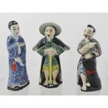 THREE 20TH CENTURY JAPANESE CERAMIC FIGURES, polychrome painted, 16cm high