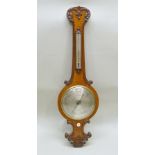 A 19TH CENTURY OAK FRAMED BAROMETER/THERMOMETER, having carved scroll decoration, the silvered