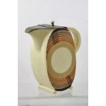 A CLARICE CLIFF HOT WATER JUG with cream glazed Deco shape oval body, painted with Gaboesque