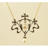 AN ART NOUVEAU STYLE GOLD COLOURED METAL SET DIAMOND AND PEARL PENDANT, fashioned in a fluid organic