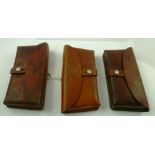 A SELECTION OF THREE EARLY 20TH CENTURY SWISS LEATHER CARTRIDGE POUCHES