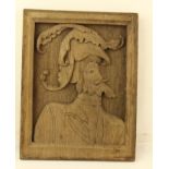 A ROMAYNE STYLE OAK PANEL, carved in relief with a profile portrait of a bearded gentleman, 33cm x