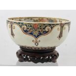 A MEIJI PERIOD JAPANESE SATSUMA GLAZED LOBED BOWL, the interior profusely decorated with