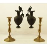 TWO 19TH CENTURY FRENCH BRONZED EWERS, the handles cast as birds with wings extended, the pouring