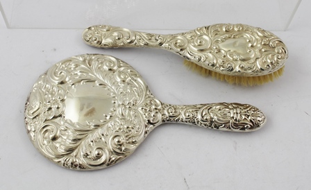 W I BROADWAY & CO A decorative silver mounted HAND VANITY MIRROR, Birmingham 1970 together with a