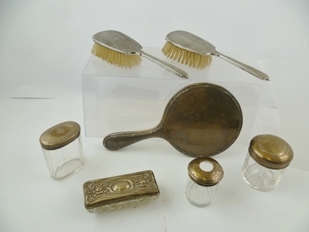 A SELECTION OF ITEMS OF SILVER AND SILVER PLATE to include; a hand mirror, two brushes and four