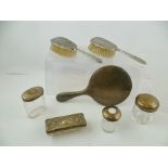 A SELECTION OF ITEMS OF SILVER AND SILVER PLATE to include; a hand mirror, two brushes and four
