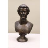 A 20TH CENTURY BRONZED COMPOSITION BUST OF MOZART 61cm high together with a mahogany display column,