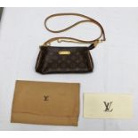 A LOUIS VUITTON SHOULDER AND HANDBAG "Eva Monogram" M95567, in outer protective maker's cloth bag,