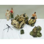 A COLLECTION OF ACTION MAN TOYS including military armoured vehicle, ATV, six Action Man figures and