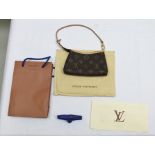 A LOUIS VUITTON - MINI POCH. "Delightful Mon" Evening bag, in outer protective maker's cloth bag,