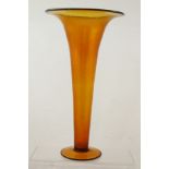 A FIRST QUARTER 20TH CENTURY AMBER GLASS TRUMPET VASE, with numerous bubble inclusions and applied