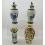 A JAPANESE SATSUMA VASE, having raised wisteria decoration, 19cm high, together with a pair of