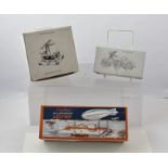 A "SCHYLLING" TIN-PLATE CLOCKWORK AIRSHIP "Graf Zeppelin" in original box, together with a CLOCKWORK