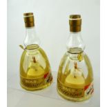 TWO NOVELTY BOTTLES OF "BOLS" LIQUEUR each fitted musical movement and rotating Ballerina in the