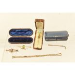 A SELECTION OF VARIOUS JEWELLERY comprising; a gold coloured metal scarf/tie pin fashioned as a golf