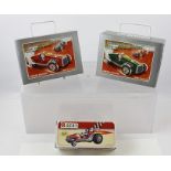 TWO "SCHYLLING" CLOCKWORK TIN-PLATE SPEEDWAY RACER CARS and one other TIN-PLATE CAR, boxed