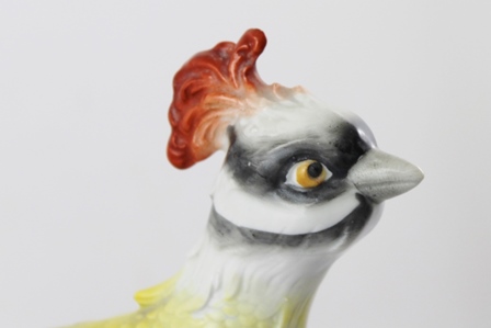 A LATE 19TH CENTURY PORCELAIN MODEL OF THE "CHELSEA BIRD", perched on a tree stump, decorated in - Image 2 of 3