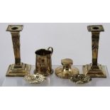 A SELECTION OF SILVER ITEMS, comprising a pair of candlesticks with garland decoration, a