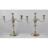 MAPPIN & WEBB A PAIR OF TWO-BRANCH CANDELABRA, with oval detachable sconces and drip pans, tapered