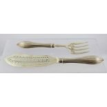 MARTIN HALL & CO. A PAIR OF VICTORIAN SILVER FISH SERVERS, each having hallmarked fretted blade