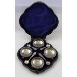 GEORGE UNITE & SONS A SET OF FOUR SILVER SQUAT SALTS, each pressed, decorated and raised on three