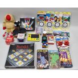 A MIXED LOT including Rubiks Cubes and puzzles some boxed, View Master 3D viewer and reels,