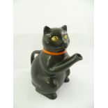 A "WOOD AND SONS LTD" POTTERY TEAPOT in the form of a black cat, backstamps include reference