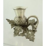 JAMES DIXON & SONS OF SHEFFIELD A LATE VICTORIAN EPBM CHAMBERSTICK, cast in thistle form, 7cm high