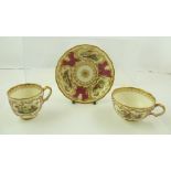 A MINTON STYLE STAFFORDSHIRE TRIO of cup, saucer and plate, with landscape vignettes