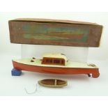 A "HORNBY" TIN PLATE CLOCKWORK SPEED BOAT no. 4, "Venture", in original box, body of vessel, 41cm