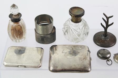 A MIXED LOT OF SILVER, comprising two cigarette cases, two watches, three bottles, a ring tree and a - Image 3 of 5