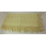 A LARGE CREAM KASHMIR STYLE SHAWL having pierced and embroidered decoration with fringing, 150cm