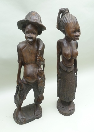 A PAIR OF 20TH CENTURY AFRICAN CARVED HARDWOOD FETISH OR FERTILITY FIGURES, in the form of a man and - Image 3 of 3