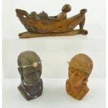 A CHINESE WOOD CARVING depicting a man in a small boat of gourds, 21cm, together with TWO