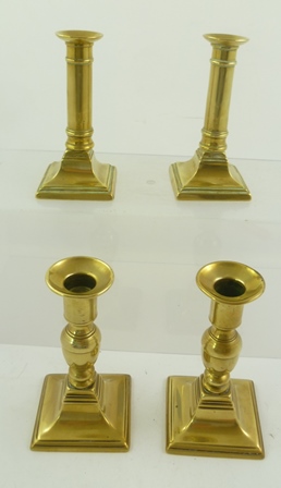 TWO PAIRS OF 19TH CENTURY BRASS CANDLESTICKS each with square base, one pair 13.5cm high, one pair