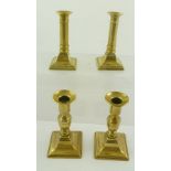 TWO PAIRS OF 19TH CENTURY BRASS CANDLESTICKS each with square base, one pair 13.5cm high, one pair