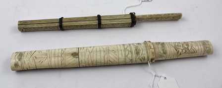 A JAPANESE MEIJI PERIOD CARVED BONE TRAVELLING EATING SET, comprising knife in scabbard with bound