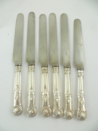 MARTIN HALL AND CO. A SET OF SIX VICTORIAN SILVER HANDLED DINNER KNIVES, Kings pattern with steel