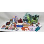 A LARGE QUANTITY OF MAINLY 1980's ACTION FIGURES including He-Man Castle Greyskull and figures,